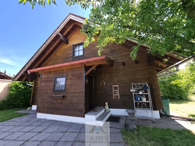 Holzhaus mit Garten & Seezugang – Wohnen, wo andere Urlaub machen! - Bild