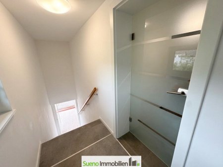 Wohnen mit Ausblick – Moderne Eigentumswohnung mit Einliegerwohnung im DG