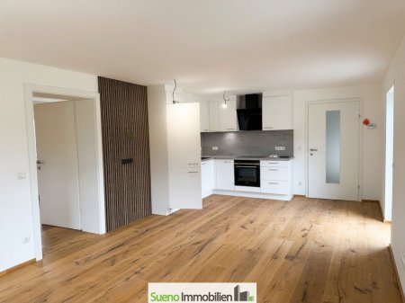 Wohnen mit Ausblick – Moderne Eigentumswohnung mit Einliegerwohnung im DG