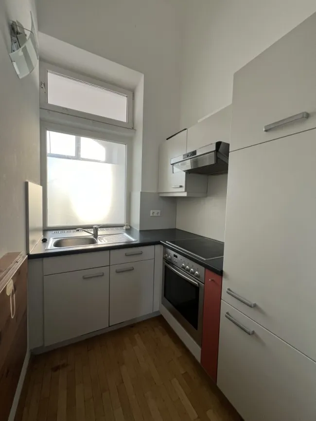Charmante 1-Zimmer-Wohnung mit Balkon in zentraler Lage - Bild