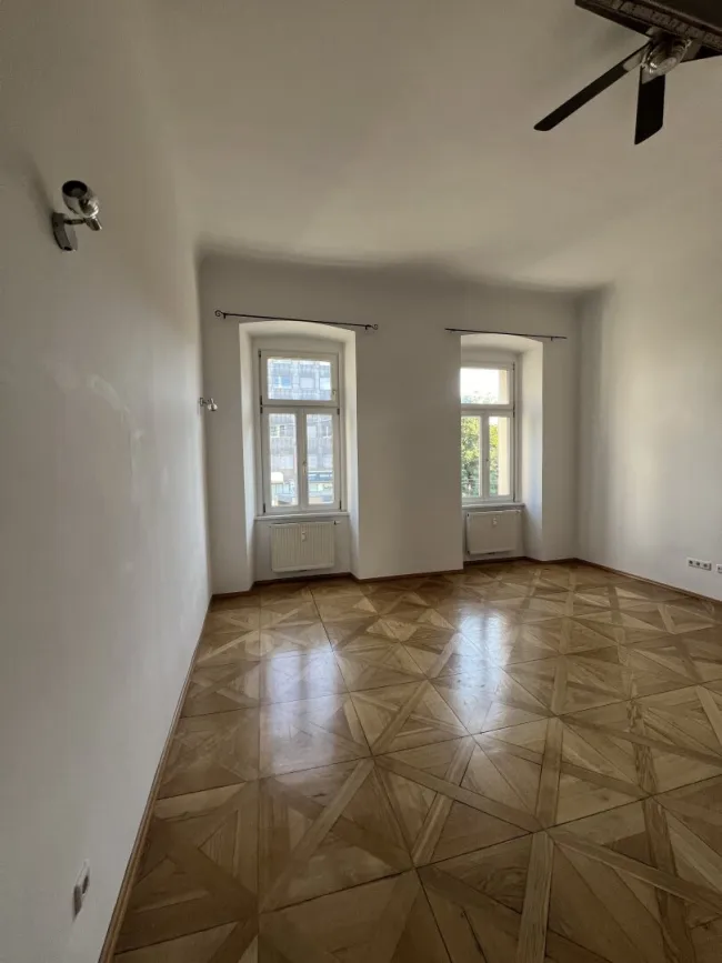 Charmante 1-Zimmer-Wohnung mit Balkon in zentraler Lage - Titelbild