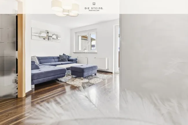 Familienidyll in Walserfeld: 84 m² pure Lebensqualität mit Balkon & Parkplatz - Titelbild