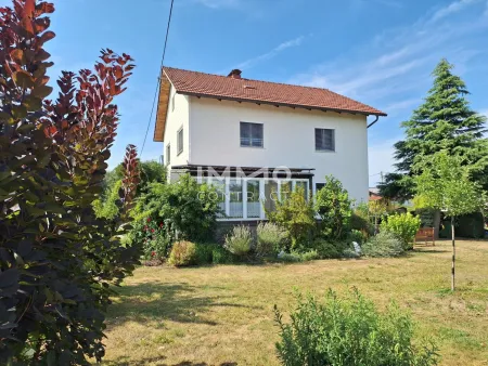 Großzügiges Ein- bis Zweifamilienhaus mit großem Garten in ruhiger Siedlungslage