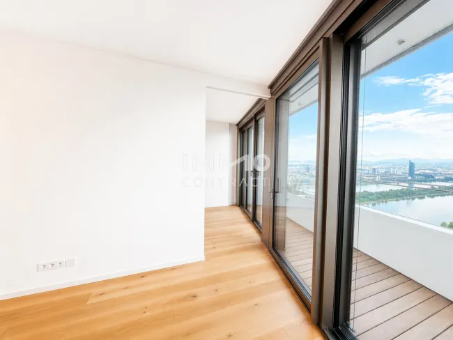 DANUBEFLATS: 40. Stock - Jeden Tag Sonnenuntergang - Edle 2-Zimmer-Wohnung - Bild