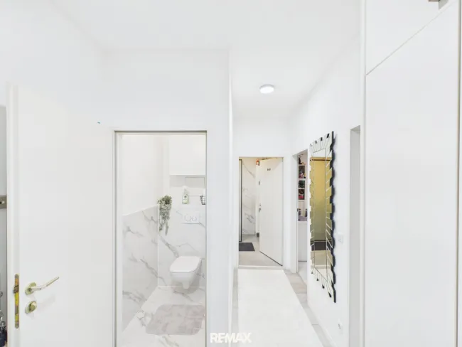 Helle 3-Zimmer-Neubauwohnung mit Balkon & Garagenstellplatz in Simmering - Bild