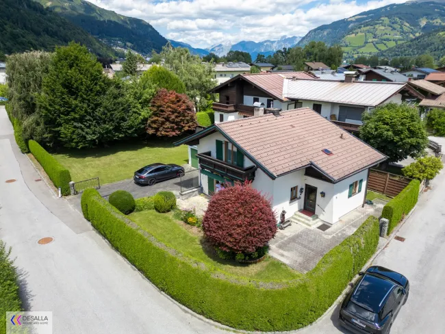 Einfamilienhaus mit alpinem Charme und hervorragendem Entwicklungspotenzial in Zell am See - Titelbild