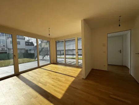 Toppreis - Neubau - Schöne 3 Zimmer Wohnung mit Terrasse und großer Gartenfläche (T 1.3 / EG)