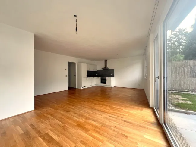Toppreis - Neubau - Schöne 3 Zimmer Wohnung mit Terrasse und großer Gartenfläche (T 1.3 / EG) - Titelbild