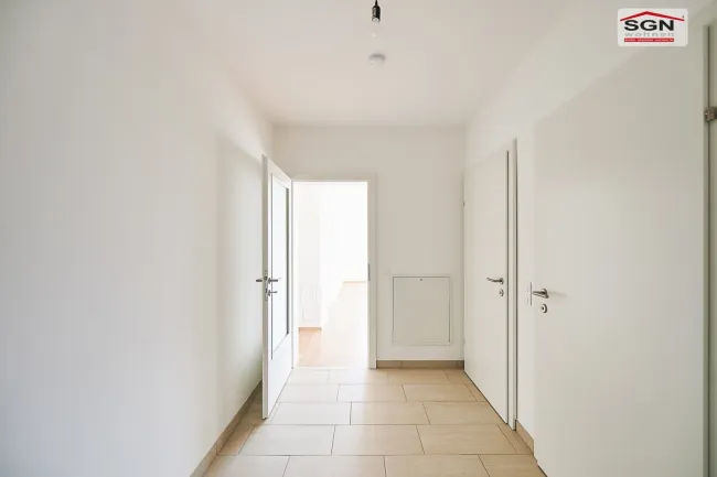 Geförderte 2 Zimmer- GARTENwohnung mit Tiefgaragenplatz - Bild