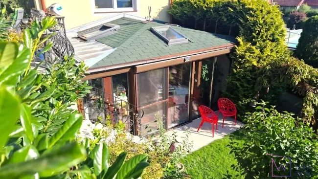 Wintergartenzubau mit direktem Gartenzugang