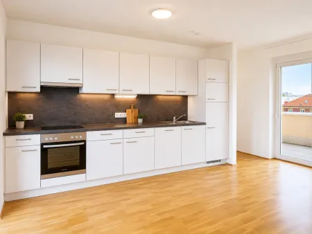 TRAUMHAFTE 3 Zimmer-Penthousewohnung mit 50m2 Dachterrasse in zentraler Lage