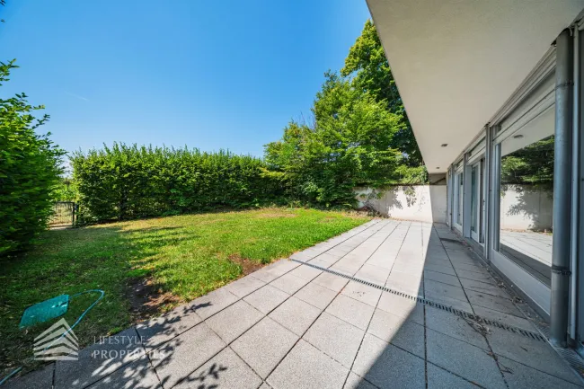 Wunderschöne 7-Zimmer Wohnung mit Garten und Terrassen - Titelbild