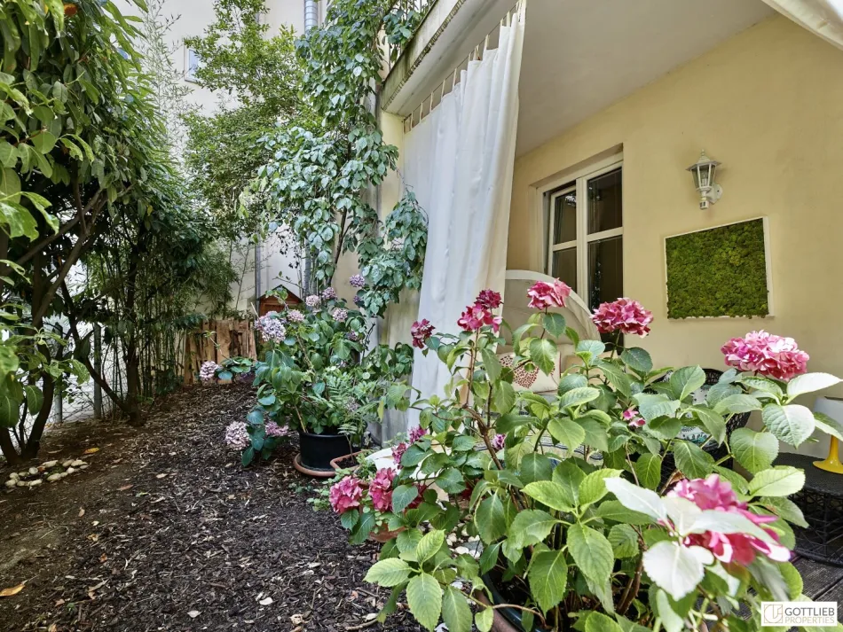Bestlage Nähe Mariahilferstraße! Exquisite 6-Zimmer-Maisonette-Wohnung mit romantischem Eigengarten und Garagenplatz - Titelbild