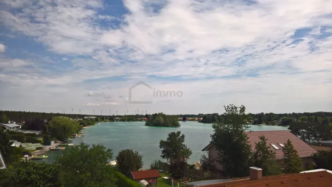 Neuwertige Doppelhaushälfte 125m² in Haschendorf mit kleinem Garten, Balkon und Seezugang - Titelbild