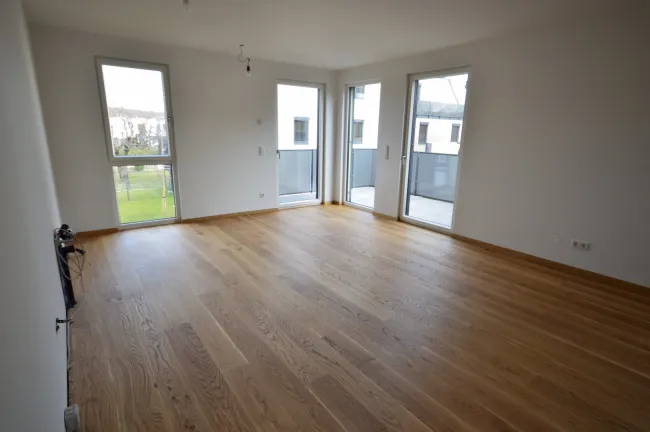 Wohnung mit großzügigem Balkon im Grünen - beheizt und gekühlt mit Erdwärme (provisionsfrei) - Bild