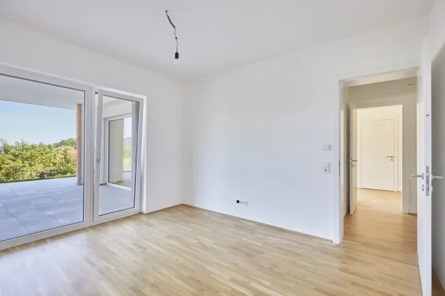 Exklusive 3-Zimmer Wohnung mit Wohnbaupreis und 192 m² Eigengarten - Bild