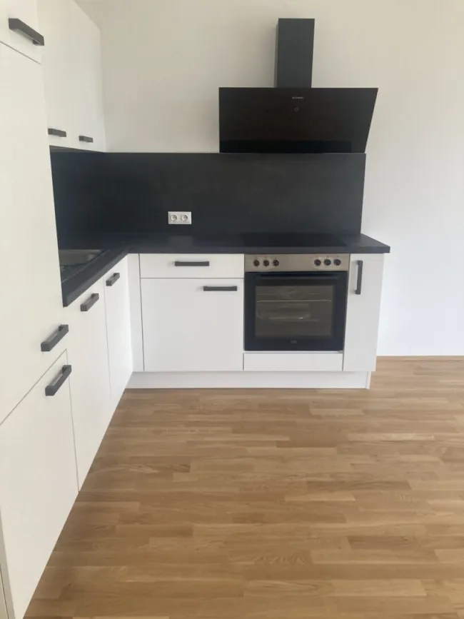 Herrliche 3-Zimmer-Wohnung mit gemütlichem Balkon, toller Aufteilung und 2 Tiefgaragenparkplätzen - Titelbild