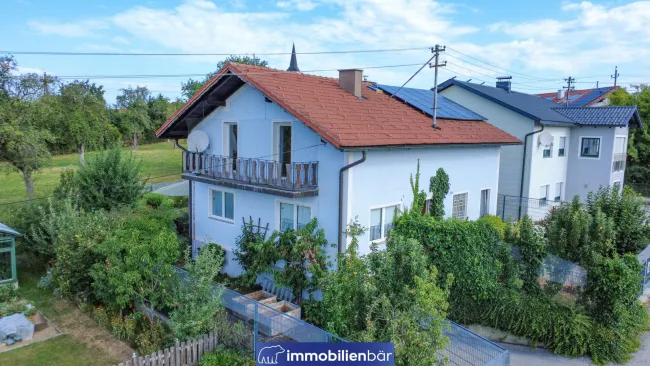 Idyllisches Einfamilienhaus mit weitläufigem Garten - Bild
