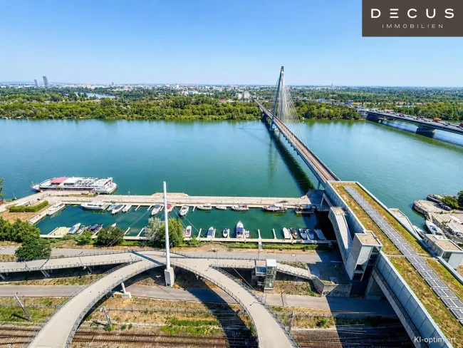 WOHNEN MIT WEITBLICK | EXKLUSVE 3 ZIMMER | UMLAUFENDE TERRASSE | HOCHWERTIGE DESIGNERKÜCHE | FERNBLICK DONAU - Bild