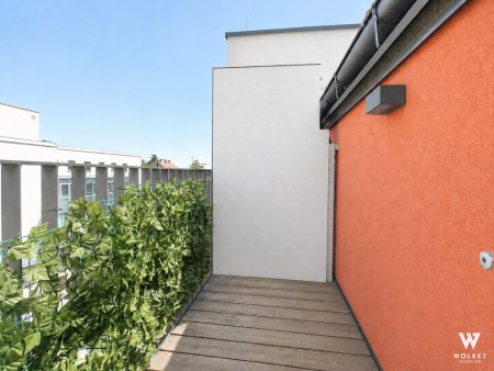 Helle Dachgeschosswohnung mit Balkon & Klima im Süden Wiens