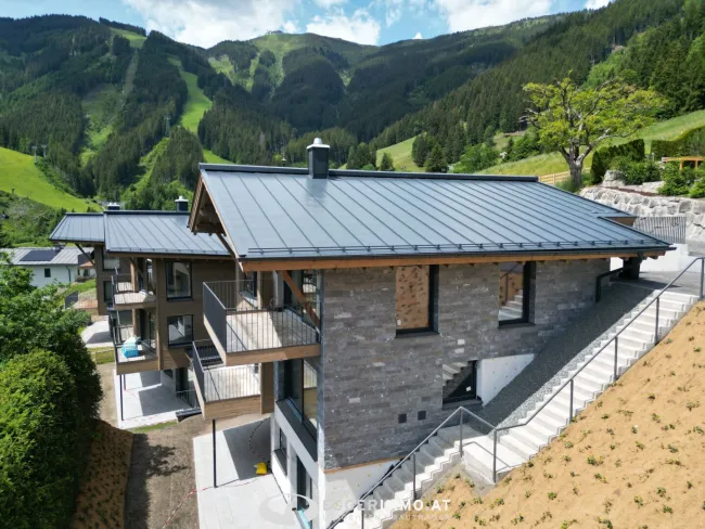 Neubau "Schmitten Lodges" in Zell am See - Exklusive Luxus Villa direkt an der Skipiste zu verkaufen - Titelbild