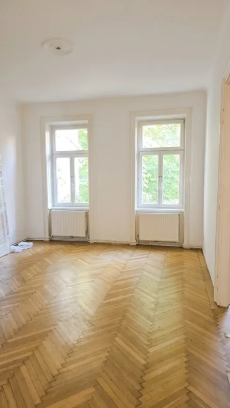 Charmante 3 Zimmer Wohnung mit 1.000m2 Gemeinschaftsgarten in 1140 Wien – Renovierungsprojekt mit Potenzial! - Titelbild