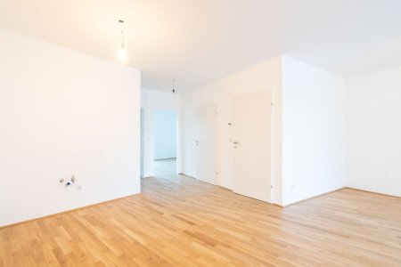 PROVISIONSFREI – Top-Erstbezug in Wels: Stilvolle Wohnung mit Balkon und Tiefgarage zu kaufen!