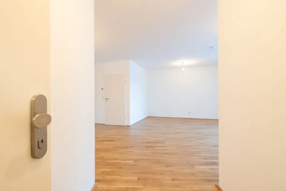PROVISIONSFREI – Top-Erstbezug in Wels: Stilvolle Wohnung mit Balkon und Tiefgarage zu kaufen! - Bild