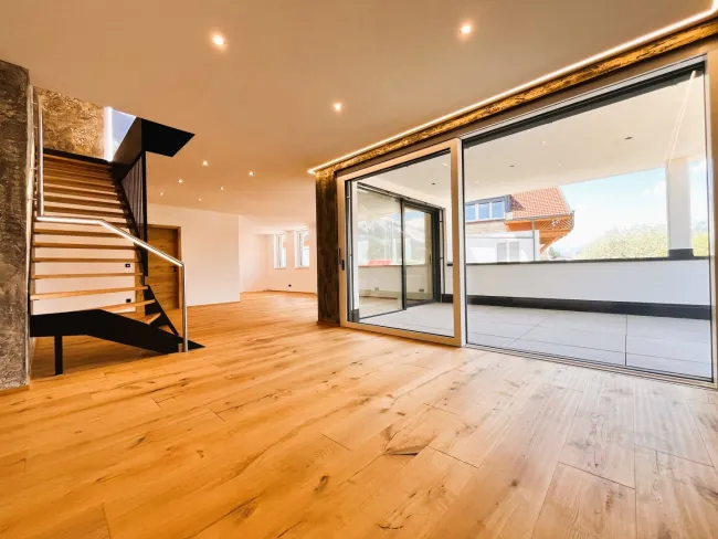 Wohn-/Essbereich mit Zugang zur ca. 25m² Terrasse