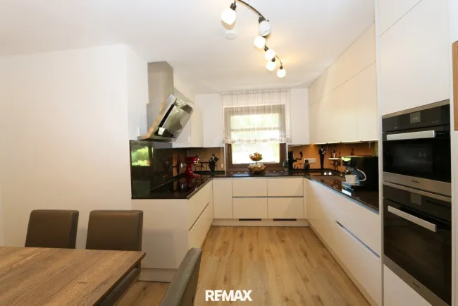Moderne 4-Zi-EG-Wohnung in Villach mit Loggia, TG und AP & Einbauküche - Bild