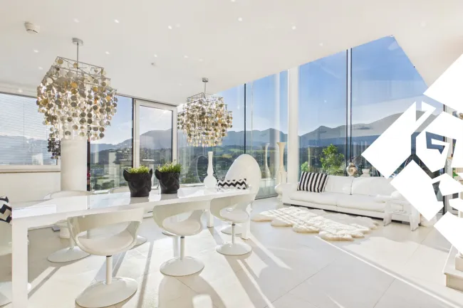 Über den Dächern von Wörgl: Penthouse auf zwei Ebenen mit Rundum-Panorama - Titelbild