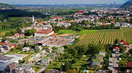 Logenplatz über den Weinbergen: Luxus-Doppelhaus am Ölberg mit Panoramablick über Wien.