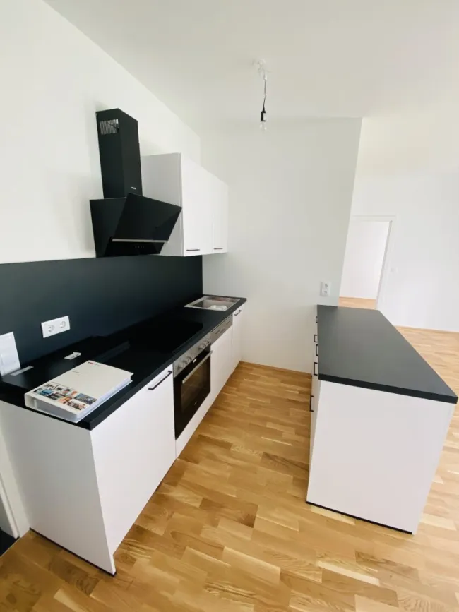 4 Zimmer-Balkonwohnung mit traumhaftem Balkon und 2 Tiefgaragenparkplätzen in spitzen Lage in Kalsdorf - Bild