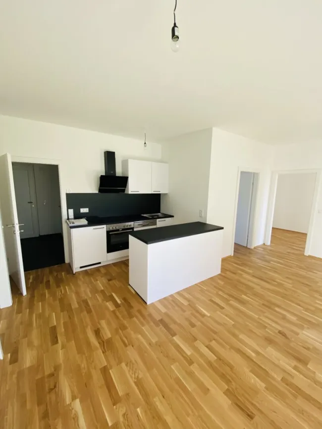 4 Zimmer-Balkonwohnung mit traumhaftem Balkon und 2 Tiefgaragenparkplätzen in spitzen Lage in Kalsdorf - Titelbild