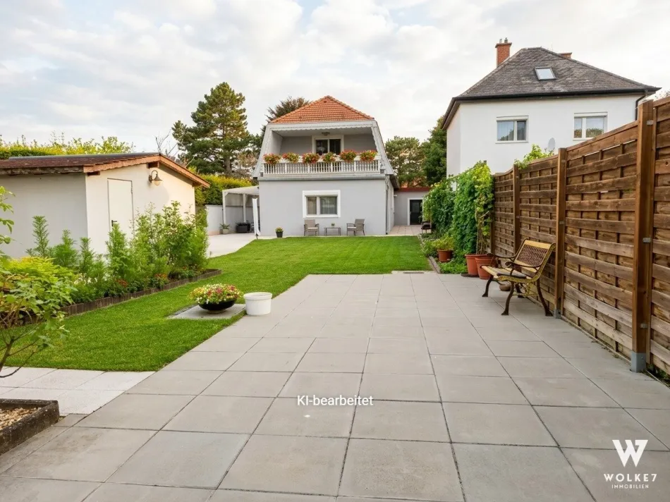Gepflegtes Einfamilienhaus mit großem Garten und Grünblick in einer sehr ruhigen Umgebung in 1220 Wien - Titelbild