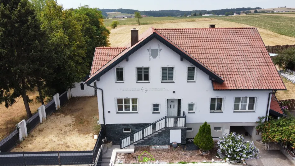 Großzügiges Wohnhaus mit schönem Garten in ruhiger Grünlage - Titelbild