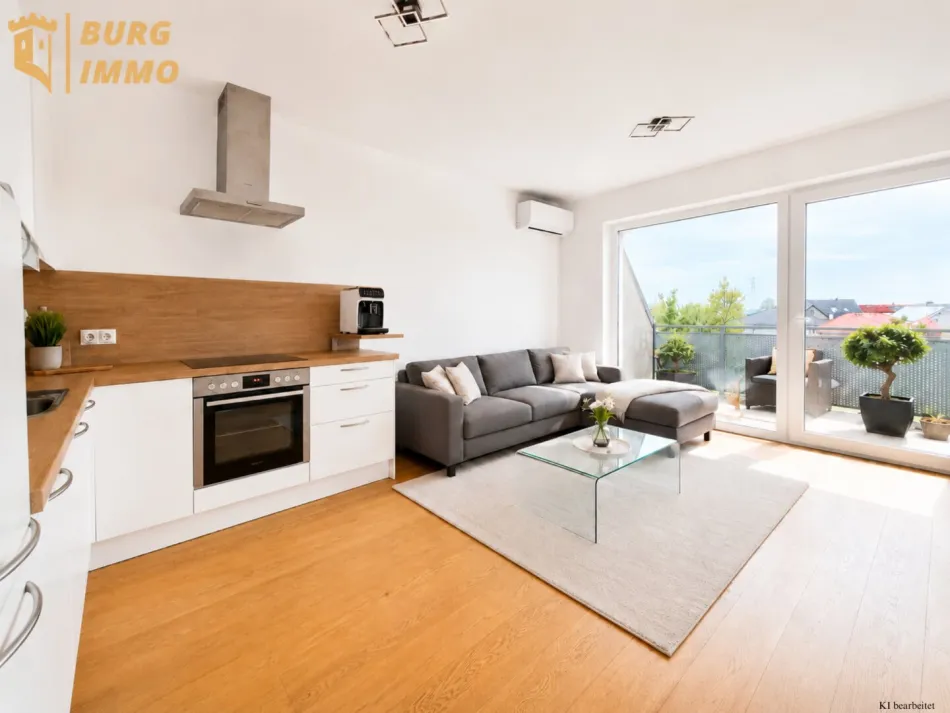 Lichtdurchflutete 2-Zimmer-Wohnung mit Terrasse & 2 Garagenplätzen - Bild