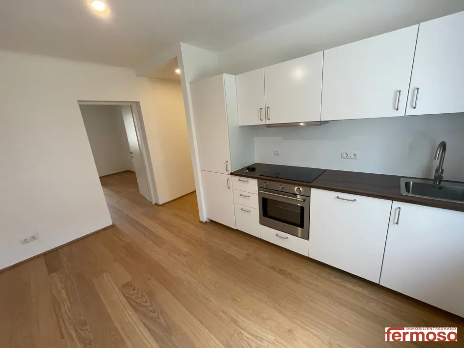 Erstbezug nach Komplettsanierung – moderne 2,5-Zimmer-Wohnung in Ebergassing - Titelbild
