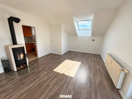 Wohn-Esszimmer mit 1 Kaminofen