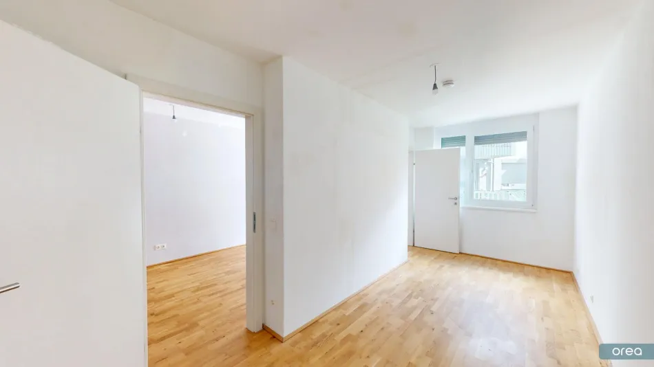 orea | Ruhige 2-Zimmer-Gartenwohnung mit Terrasse im 22. Bezirk | Smart besichtigen · Online anmieten - Bild