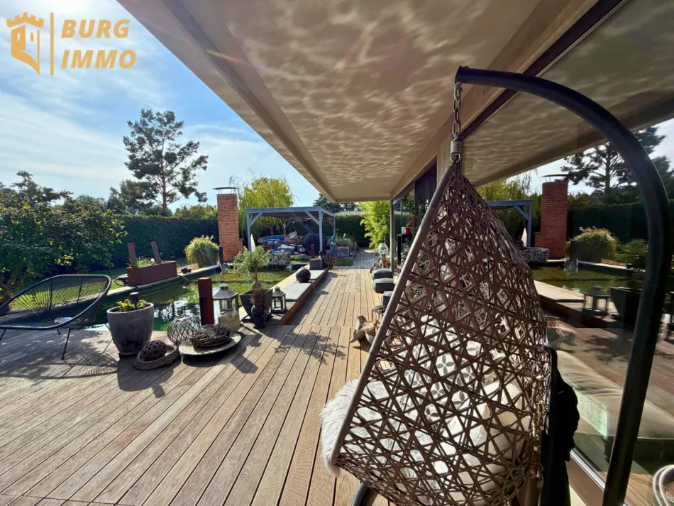 Einzigartiger Design-Bungalow mit Schwimmteich & Wellnessgarten nahe dem Neufelder See - Bild