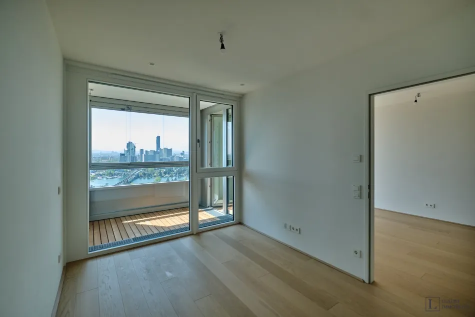 Neubau Erstbezug - mit umfassendem Blick aus dem 24. Stock auf die Alte Donau und Vienna International Center - Titelbild