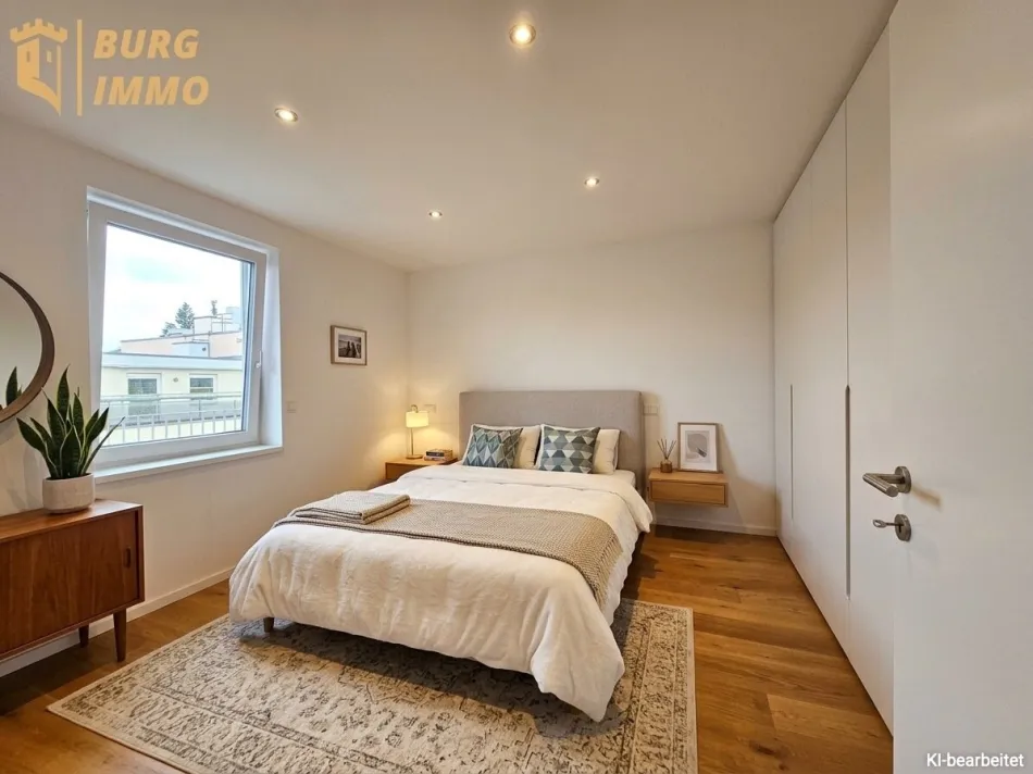 Klimatisierte 2-Zimmer-Dachgeschosswohnung mit großzügiger 33 m² Eckterrasse - Bild