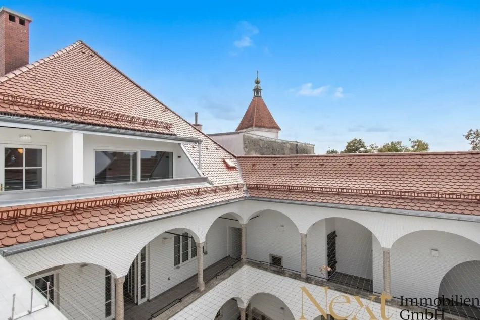 Wohnen mit Charme & Moderne – Dachgeschosswohnung mit Lift im Herzen von Wels! - Titelbild