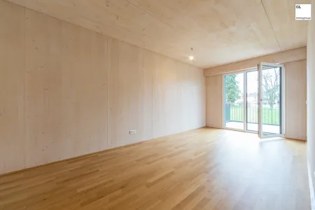 Gemütliches Schlafzimmer mit Zugang auf die Terrasse