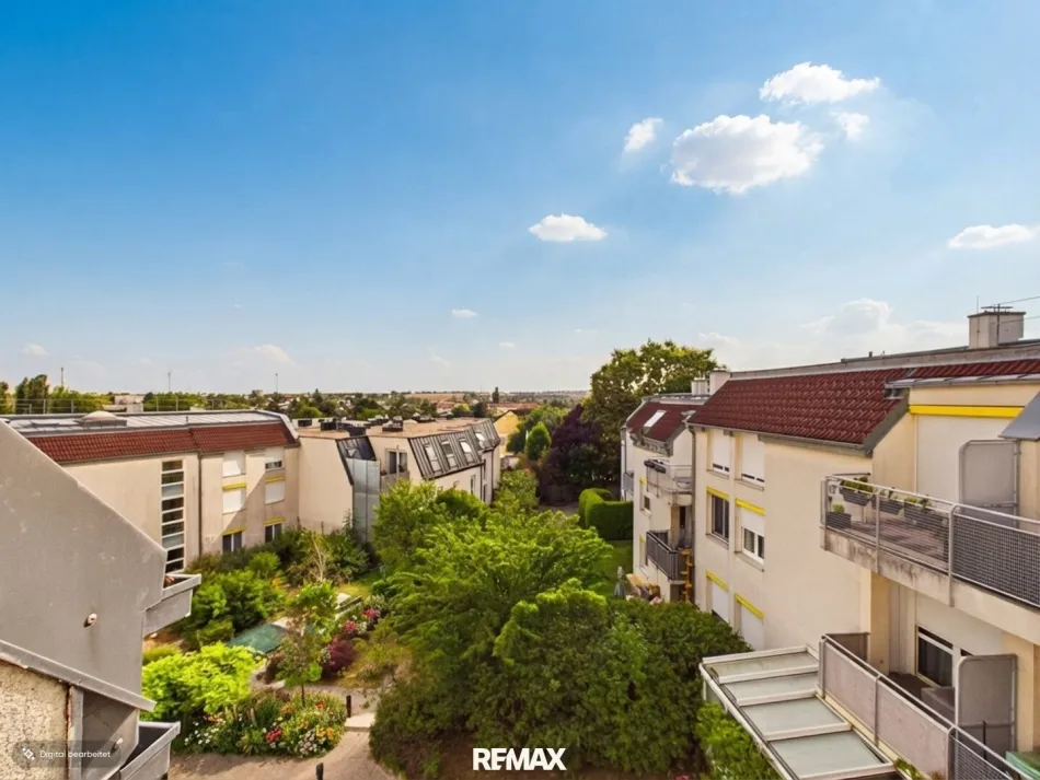 Fernblick: 3-Zimmer-Dachgeschosswhg. in Wolkersdorf mit Loggia und Tiefgaragenplatz - Bild