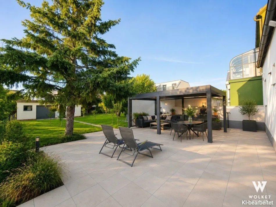 Saniertes Einfamilienhaus mit großer Terrasse und Garten in 1220 Wien | ca. 500 m² Grundstück | Garage | Werkstatt - Titelbild