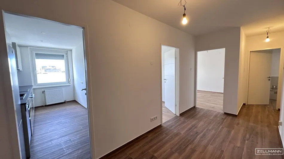 Lichtdurchflutete Dachgeschosswohnung mit Balkon | ZELLMANN IMMOBILIEN - Bild