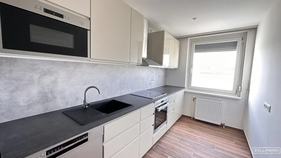 Lichtdurchflutete Dachgeschosswohnung mit Balkon | ZELLMANN IMMOBILIEN - Bild