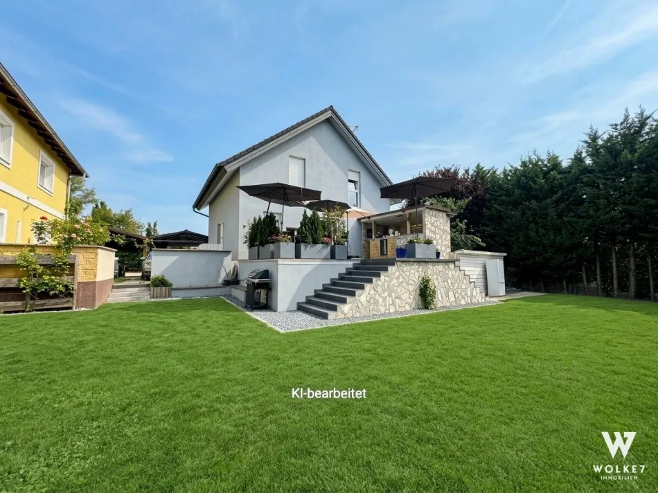 Einfamilienhaus mit 3 Schlafzimmern, offener Wohnküche, Garten & Carport | Nähe Lobau & Donau-Oder-Kanal - Titelbild